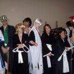 Bleach characters, from left to right: Uryu, Urahara, Izuru, Chad, Gin, Momo, Rukia, and Renji